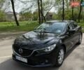 Черный Мазда 6, объемом двигателя 2.18 л и пробегом 260 тыс. км за 8900 $, фото 1 на Automoto.ua