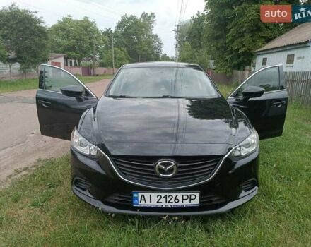 Черный Мазда 6, объемом двигателя 2.5 л и пробегом 170 тыс. км за 11200 $, фото 1 на Automoto.ua