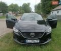 Черный Мазда 6, объемом двигателя 2.5 л и пробегом 170 тыс. км за 11200 $, фото 1 на Automoto.ua