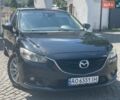 Черный Мазда 6, объемом двигателя 2 л и пробегом 152 тыс. км за 12000 $, фото 1 на Automoto.ua