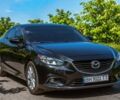 Черный Мазда 6, объемом двигателя 2.4 л и пробегом 210 тыс. км за 10800 $, фото 1 на Automoto.ua