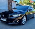 Черный Мазда 6, объемом двигателя 2.49 л и пробегом 175 тыс. км за 12200 $, фото 1 на Automoto.ua