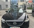 Черный Мазда 6, объемом двигателя 2.49 л и пробегом 245 тыс. км за 12000 $, фото 1 на Automoto.ua