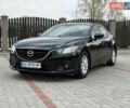 Черный Мазда 6, объемом двигателя 2.2 л и пробегом 250 тыс. км за 10000 $, фото 1 на Automoto.ua