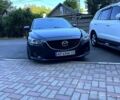 Черный Мазда 6, объемом двигателя 2 л и пробегом 211 тыс. км за 11000 $, фото 1 на Automoto.ua