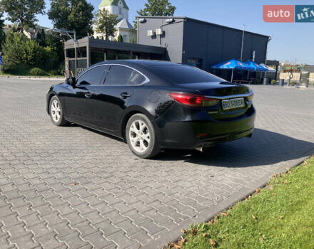 Чорний Мазда 6, об'ємом двигуна 2.49 л та пробігом 150 тис. км за 9699 $, фото 1 на Automoto.ua