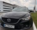 Черный Мазда 6, объемом двигателя 2 л и пробегом 87 тыс. км за 10500 $, фото 1 на Automoto.ua