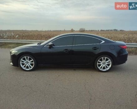 Черный Мазда 6, объемом двигателя 2.49 л и пробегом 186 тыс. км за 9900 $, фото 6 на Automoto.ua