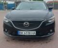Черный Мазда 6, объемом двигателя 2.5 л и пробегом 198 тыс. км за 10500 $, фото 1 на Automoto.ua