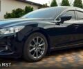 Черный Мазда 6, объемом двигателя 2 л и пробегом 144 тыс. км за 12300 $, фото 1 на Automoto.ua