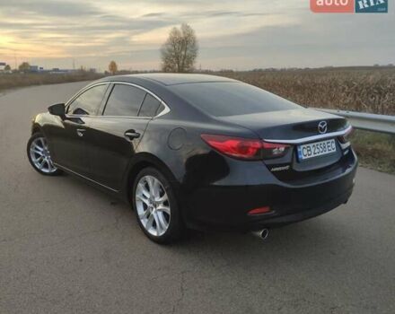 Черный Мазда 6, объемом двигателя 2.49 л и пробегом 186 тыс. км за 9900 $, фото 1 на Automoto.ua