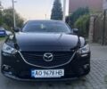 Черный Мазда 6, объемом двигателя 2 л и пробегом 118 тыс. км за 11500 $, фото 1 на Automoto.ua