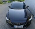 Черный Мазда 6, объемом двигателя 2.5 л и пробегом 175 тыс. км за 10540 $, фото 1 на Automoto.ua