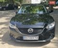 Черный Мазда 6, объемом двигателя 2 л и пробегом 250 тыс. км за 11500 $, фото 1 на Automoto.ua