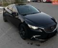 Черный Мазда 6, объемом двигателя 2.49 л и пробегом 185 тыс. км за 11500 $, фото 1 на Automoto.ua