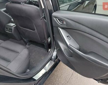 Черный Мазда 6, объемом двигателя 2.49 л и пробегом 94 тыс. км за 12850 $, фото 1 на Automoto.ua