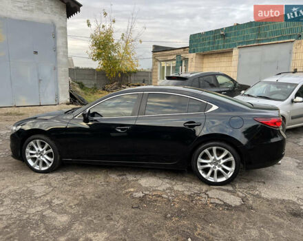 Черный Мазда 6, объемом двигателя 2.49 л и пробегом 135 тыс. км за 14500 $, фото 1 на Automoto.ua