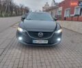 Черный Мазда 6, объемом двигателя 2.49 л и пробегом 255 тыс. км за 12700 $, фото 1 на Automoto.ua