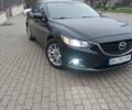 Черный Мазда 6, объемом двигателя 2.49 л и пробегом 255 тыс. км за 11700 $, фото 1 на Automoto.ua