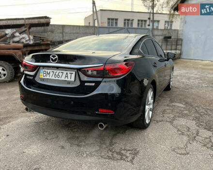 Черный Мазда 6, объемом двигателя 2.49 л и пробегом 135 тыс. км за 14500 $, фото 4 на Automoto.ua