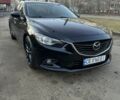 Черный Мазда 6, объемом двигателя 2.5 л и пробегом 152 тыс. км за 12400 $, фото 1 на Automoto.ua