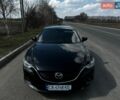 Черный Мазда 6, объемом двигателя 2.49 л и пробегом 320 тыс. км за 10400 $, фото 1 на Automoto.ua