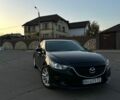 Черный Мазда 6, объемом двигателя 2.49 л и пробегом 250 тыс. км за 11000 $, фото 1 на Automoto.ua