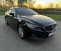 Черный Мазда 6, объемом двигателя 2.5 л и пробегом 320 тыс. км за 10399 $, фото 1 на Automoto.ua