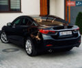 Черный Мазда 6, объемом двигателя 2.2 л и пробегом 209 тыс. км за 11500 $, фото 1 на Automoto.ua