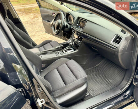 Черный Мазда 6, объемом двигателя 2 л и пробегом 152 тыс. км за 12490 $, фото 24 на Automoto.ua