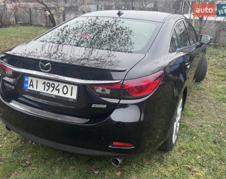 Черный Мазда 6, объемом двигателя 2.49 л и пробегом 178 тыс. км за 11900 $, фото 9 на Automoto.ua