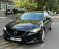 Черный Мазда 6, объемом двигателя 2.49 л и пробегом 183 тыс. км за 11500 $, фото 1 на Automoto.ua