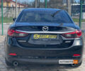Черный Мазда 6, объемом двигателя 2.5 л и пробегом 187 тыс. км за 12500 $, фото 4 на Automoto.ua
