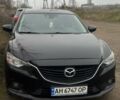 Черный Мазда 6, объемом двигателя 2.49 л и пробегом 198 тыс. км за 11500 $, фото 1 на Automoto.ua