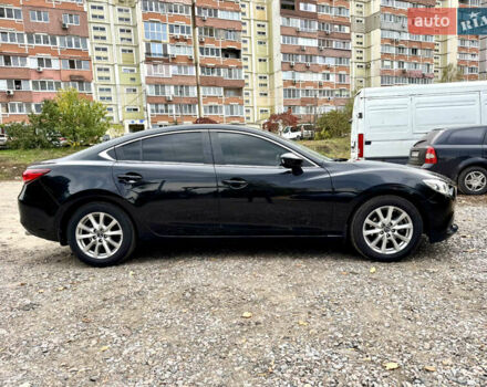 Черный Мазда 6, объемом двигателя 2 л и пробегом 152 тыс. км за 12490 $, фото 1 на Automoto.ua
