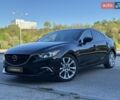 Черный Мазда 6, объемом двигателя 2.49 л и пробегом 103 тыс. км за 14499 $, фото 1 на Automoto.ua