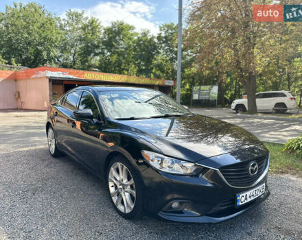 Черный Мазда 6, объемом двигателя 2.49 л и пробегом 200 тыс. км за 11400 $, фото 1 на Automoto.ua
