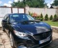 Черный Мазда 6, объемом двигателя 2.5 л и пробегом 273 тыс. км за 15000 $, фото 1 на Automoto.ua