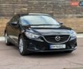 Черный Мазда 6, объемом двигателя 2.49 л и пробегом 225 тыс. км за 9500 $, фото 1 на Automoto.ua