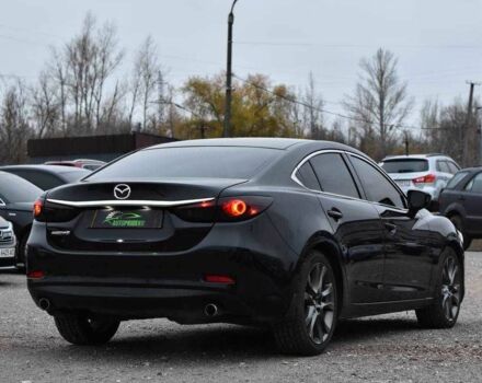 Черный Мазда 6, объемом двигателя 2.5 л и пробегом 182 тыс. км за 12999 $, фото 1 на Automoto.ua