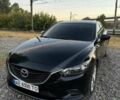 Черный Мазда 6, объемом двигателя 2.5 л и пробегом 143 тыс. км за 10100 $, фото 1 на Automoto.ua