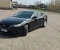 Черный Мазда 6, объемом двигателя 2.49 л и пробегом 133 тыс. км за 14000 $, фото 1 на Automoto.ua