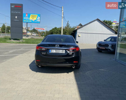 Черный Мазда 6, объемом двигателя 2.49 л и пробегом 143 тыс. км за 11600 $, фото 5 на Automoto.ua