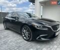 Черный Мазда 6, объемом двигателя 2.49 л и пробегом 180 тыс. км за 13300 $, фото 1 на Automoto.ua