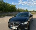 Черный Мазда 6, объемом двигателя 2.49 л и пробегом 237 тыс. км за 12000 $, фото 1 на Automoto.ua