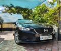 Черный Мазда 6, объемом двигателя 2.5 л и пробегом 198 тыс. км за 10900 $, фото 1 на Automoto.ua