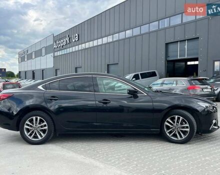 Черный Мазда 6, объемом двигателя 2.2 л и пробегом 178 тыс. км за 15990 $, фото 5 на Automoto.ua