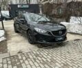 Черный Мазда 6, объемом двигателя 2.5 л и пробегом 208 тыс. км за 12100 $, фото 1 на Automoto.ua