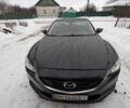 Черный Мазда 6, объемом двигателя 2.5 л и пробегом 233 тыс. км за 12500 $, фото 1 на Automoto.ua