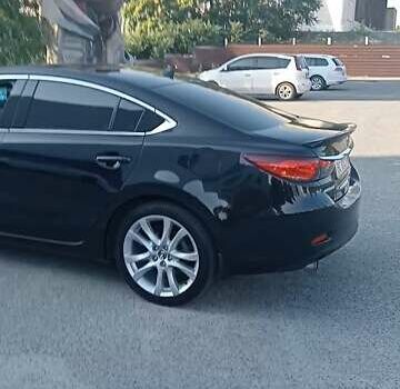 Черный Мазда 6, объемом двигателя 2.49 л и пробегом 157 тыс. км за 12200 $, фото 1 на Automoto.ua